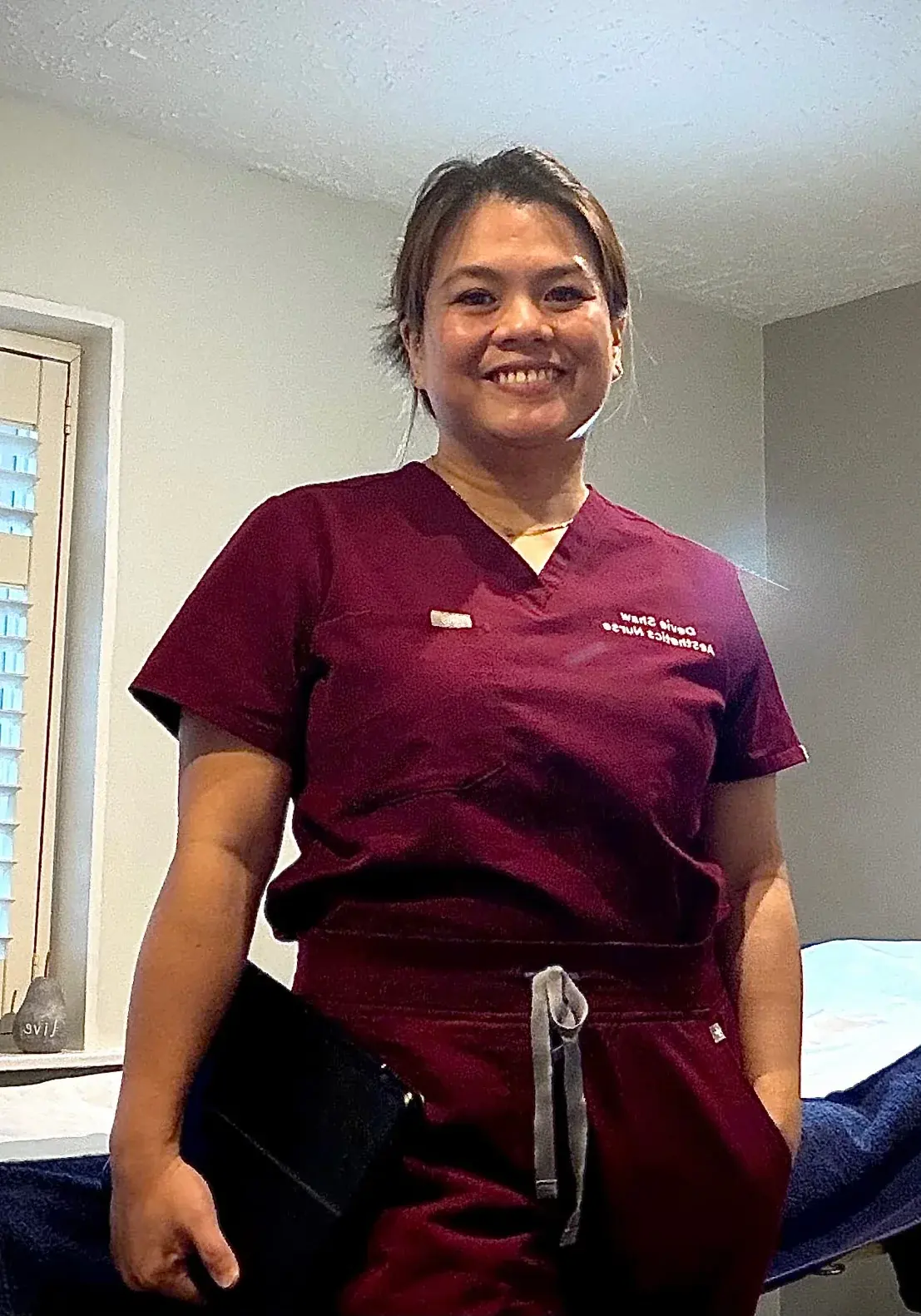 Devie Shaw, advanced aesthetics nurse and founder of DA Aesthetics, in her treatment room